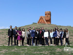 Traditional group photo at the "We Are Our Mountains" Statue